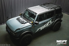 Gray SUV with 'NEPT' branding on a gray background