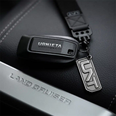 Full view of the URNIETA key fob kit with buttons and logo detailing, designed specifically for Prado 250 models.