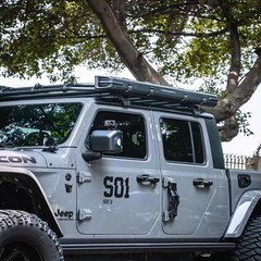 jeep gladiator side awning side view mounted on fury awaken series roof rack in the case