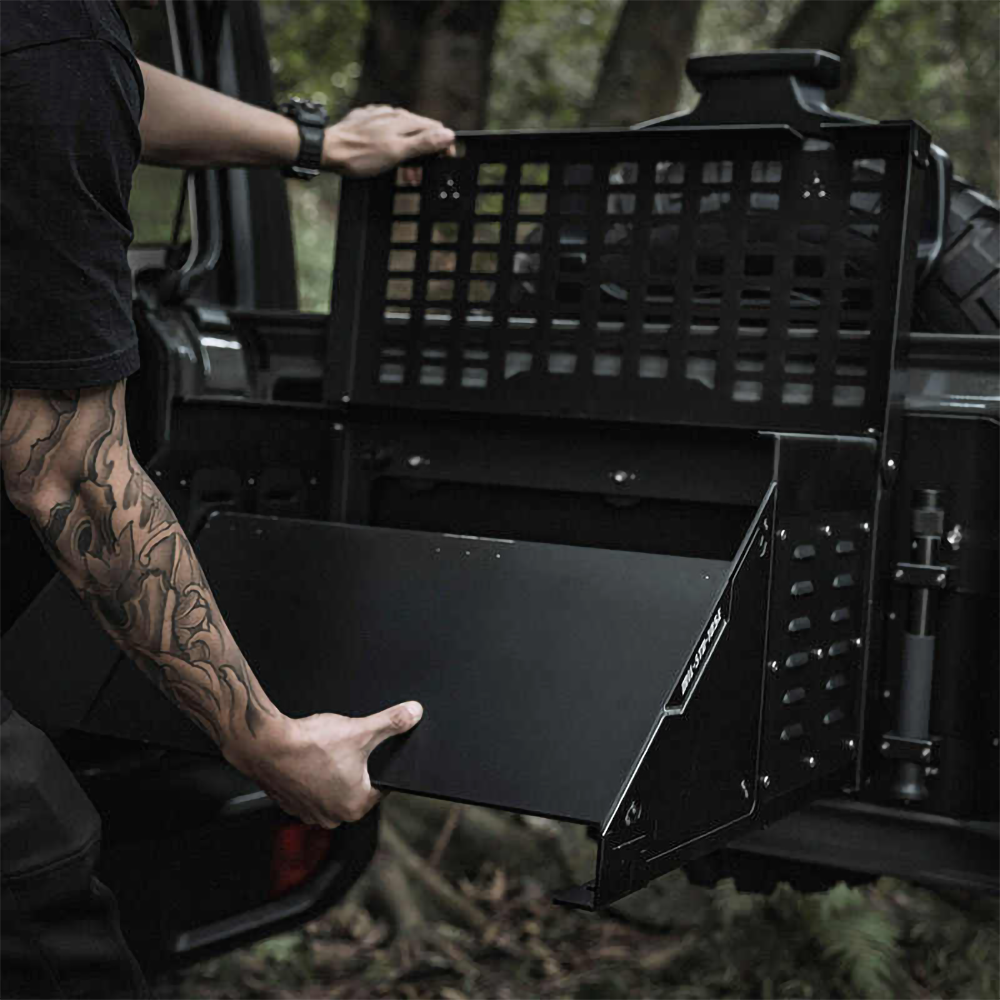 jeep rear door table showing man opening the table front view black in color