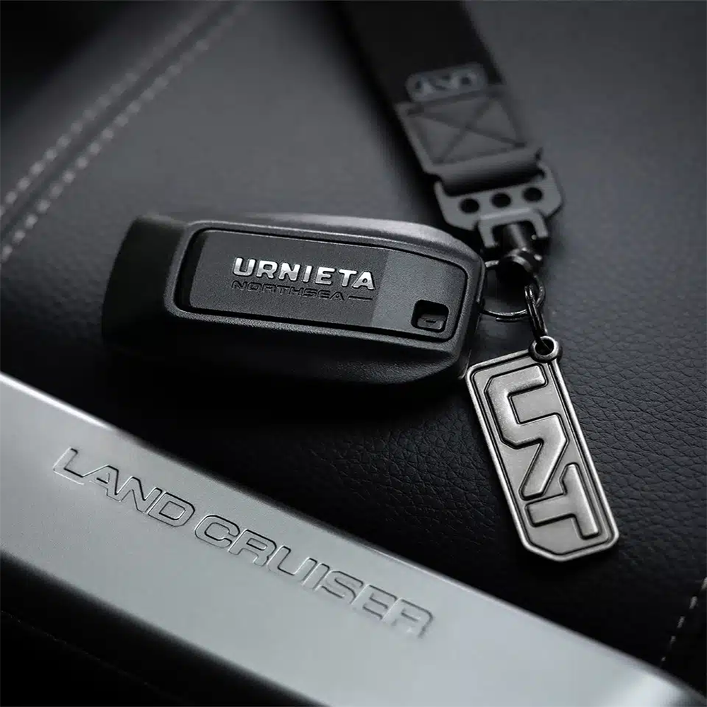 Full view of the URNIETA key fob kit with buttons and logo detailing, designed specifically for Prado 250 models.
